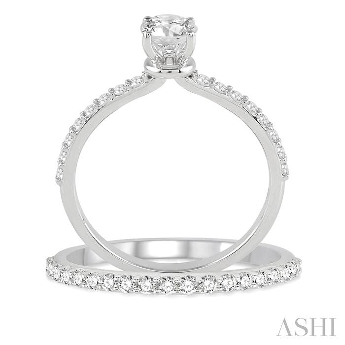 1 Ctw Diamond Wedding Set with 3/4 Ctw Round Cut Engagement Ring and 1/3 Ctw Wedding Band in 14K White Gold
