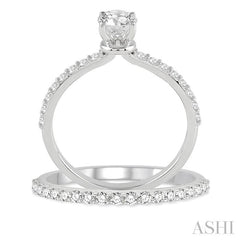 1 Ctw Diamond Wedding Set with 3/4 Ctw Round Cut Engagement Ring and 1/3 Ctw Wedding Band in 14K White Gold