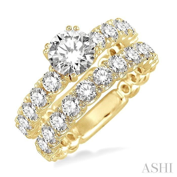 3 Ctw Diamond Wedding Set with 1 3/4 Ctw Round Cut Engagement Ring and 1 1/5 Ctw Wedding Band in 14K Yellow Gold