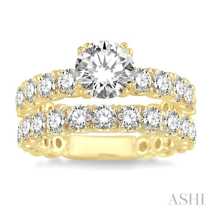 3 Ctw Diamond Wedding Set with 1 3/4 Ctw Round Cut Engagement Ring and 1 1/5 Ctw Wedding Band in 14K Yellow Gold