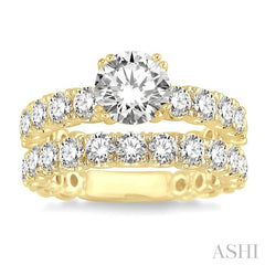 3 Ctw Diamond Wedding Set with 1 3/4 Ctw Round Cut Engagement Ring and 1 1/5 Ctw Wedding Band in 14K Yellow Gold