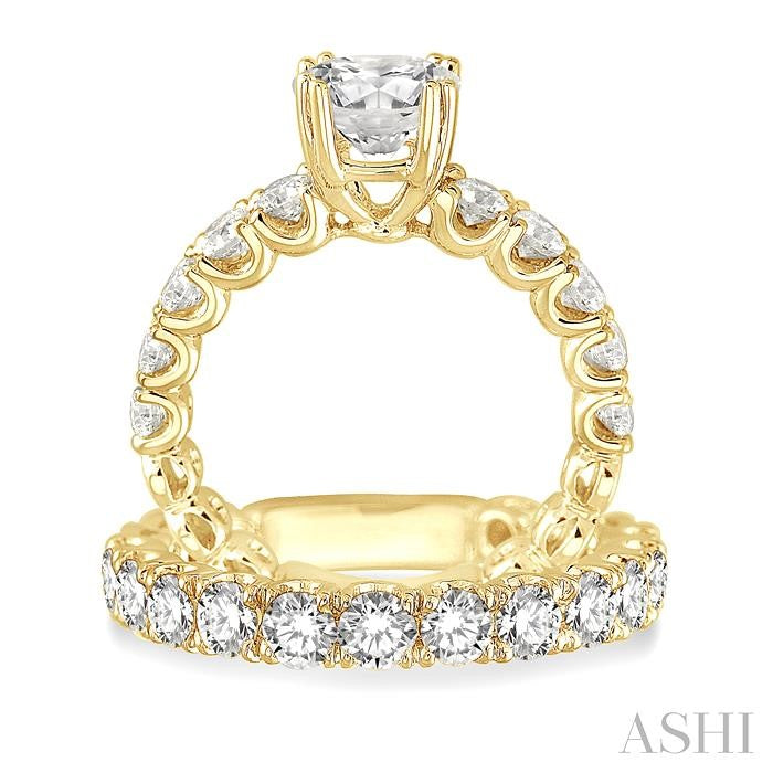 3 Ctw Diamond Wedding Set with 1 3/4 Ctw Round Cut Engagement Ring and 1 1/5 Ctw Wedding Band in 14K Yellow Gold