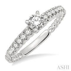 1/4 Ctw Round Cut Diamond Semi-Mount Engagement Ring in 14K White Gold
