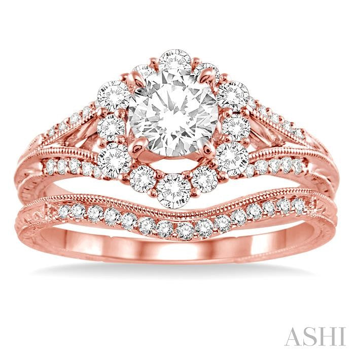 1 1/10 Ctw Diamond Wedding Set with 1 Ctw Round Cut Engagement Ring and 1/10 Ctw Wedding Band in 14K Rose Gold