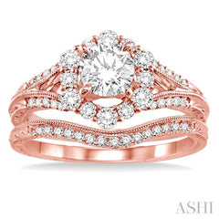 1 1/10 Ctw Diamond Wedding Set with 1 Ctw Round Cut Engagement Ring and 1/10 Ctw Wedding Band in 14K Rose Gold