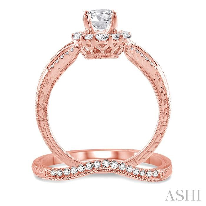 1 1/10 Ctw Diamond Wedding Set with 1 Ctw Round Cut Engagement Ring and 1/10 Ctw Wedding Band in 14K Rose Gold