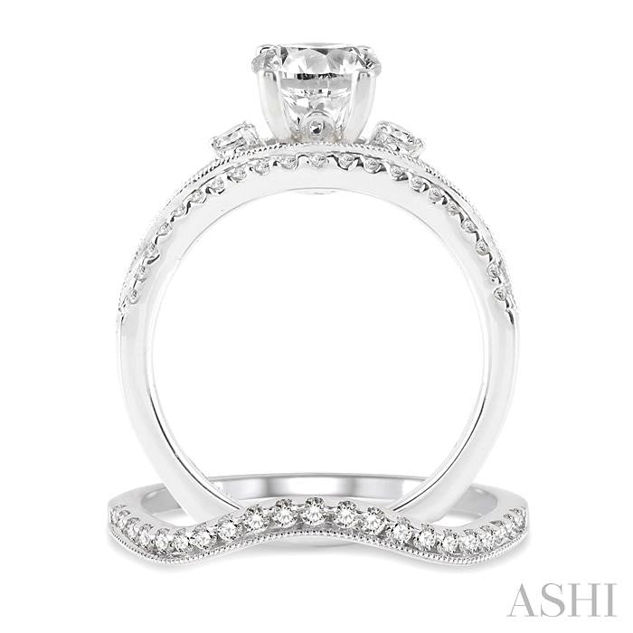 1 1/10 Ctw Diamond Wedding Set with 1 Ctw Round Cut Engagement Ring and 1/6 Ctw Wedding Band in 14K White Gold