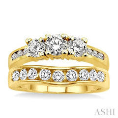1 1/2 Ctw Diamond Wedding Set with 1 Ctw Round Cut Engagement Ring and 1/2 Ctw Wedding Band in 14K Yellow Gold