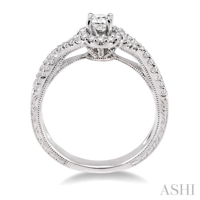 1/2 Ctw Diamond Engagement Ring with 1/5 Ct Round Cut Center Stone in 14K White Gold