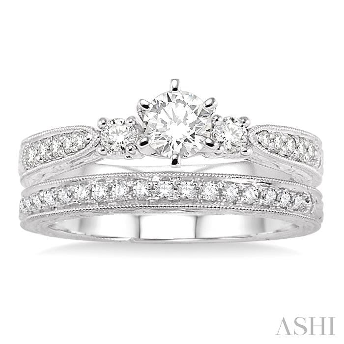 3/4 ctw Diamond Wedding Set with 5/8 ctw Round Cut Engagement Ring and 1/5 ctw Wedding Band in 14K White Gold