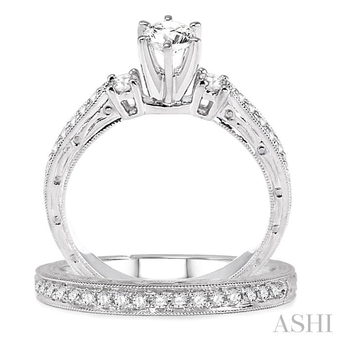 3/4 ctw Diamond Wedding Set with 5/8 ctw Round Cut Engagement Ring and 1/5 ctw Wedding Band in 14K White Gold