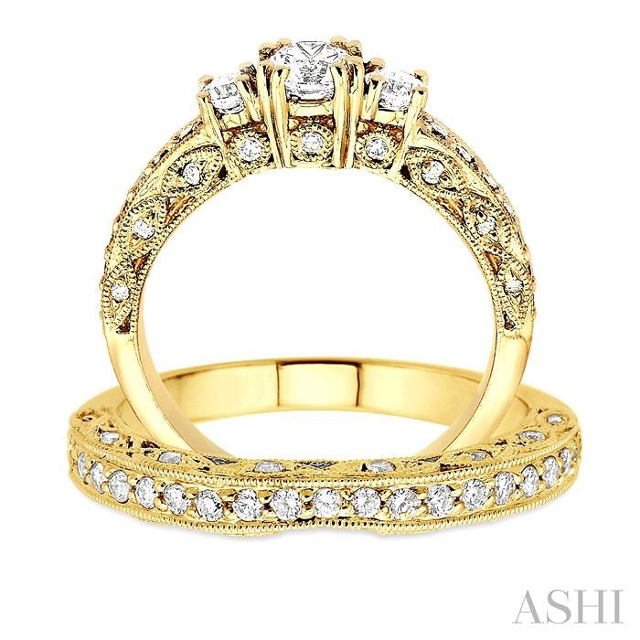 1 1/4 ctw Diamond Wedding Set with 7/8 ctw Round Cut Engagement Ring and 3/8 ctw Wedding Band in 14K Yellow Gold