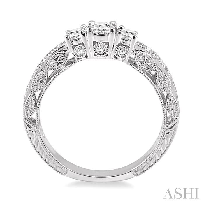 1/2 Ctw Diamond Engagement Ring with 1/5 Ct Round Cut Center Stone in 14K White Gold