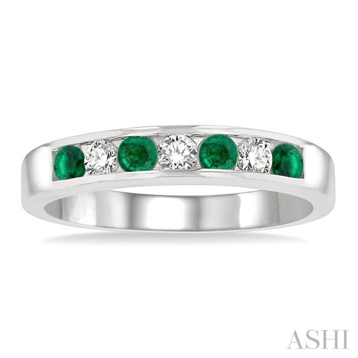 2.5 MM Round Cut Emerald and 1/5 Ctw Channel Set Round Cut Diamond Band in 14K White Gold