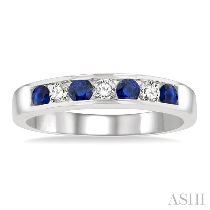 2.5 MM Round Cut Sapphire and 1/5 Ctw Channel Set Round Cut Diamond Band in 14K White Gold