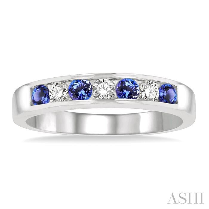 2.5 MM Round Cut Tanzanite and 1/5 Ctw Channel Set Round Cut Diamond Band in 14K White Gold