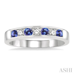 2.5 MM Round Cut Tanzanite and 1/5 Ctw Channel Set Round Cut Diamond Band in 14K White Gold