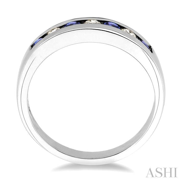 2.5 MM Round Cut Tanzanite and 1/5 Ctw Channel Set Round Cut Diamond Band in 14K White Gold