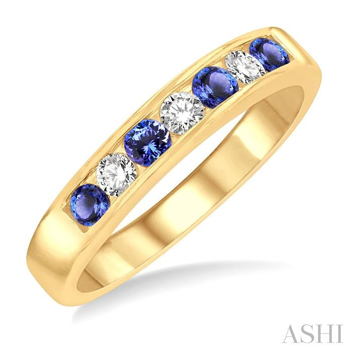 2.5 MM Round Cut Tanzanite and 1/5 Ctw Channel Set Round Cut Diamond Band in 14K Yellow Gold