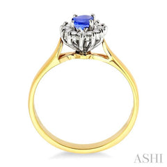 6x4MM Oval Cut Tanzanite and 1/5 Ctw Round Cut Diamond Ring in 14K Yellow Gold
