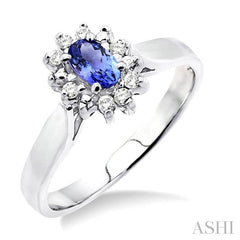 5x3mm Oval Cut Tanzanite and 1/10 Ctw Round Cut Diamond Ring in 14K White Gold