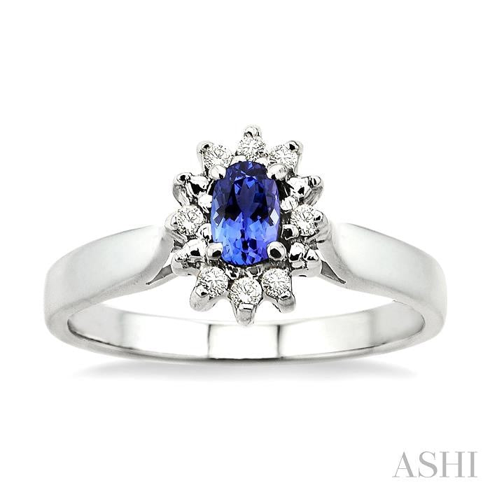 5x3mm Oval Cut Tanzanite and 1/10 Ctw Round Cut Diamond Ring in 14K White Gold