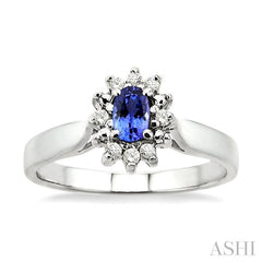 5x3mm Oval Cut Tanzanite and 1/10 Ctw Round Cut Diamond Ring in 14K White Gold