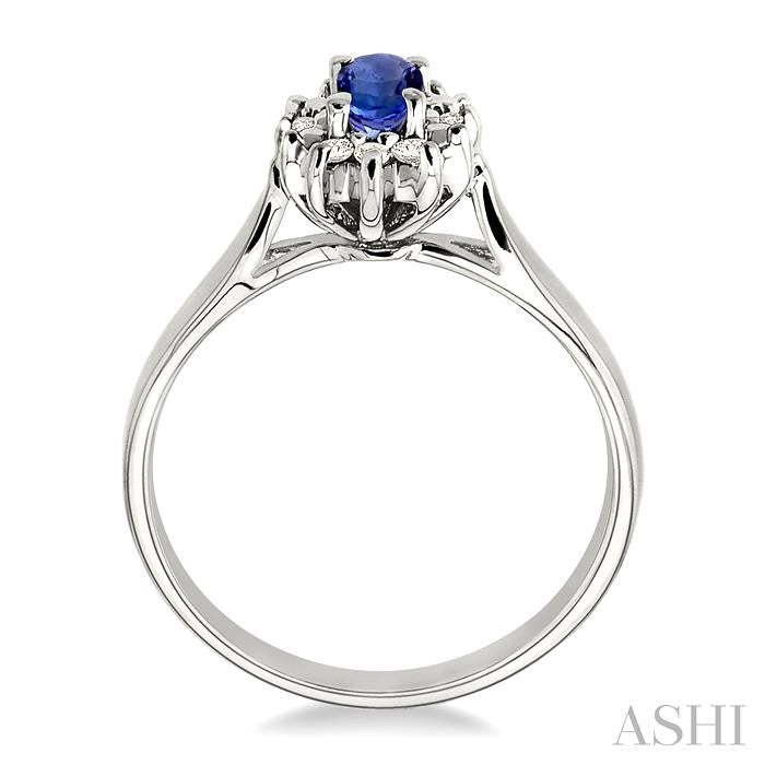 5x3mm Oval Cut Tanzanite and 1/10 Ctw Round Cut Diamond Ring in 14K White Gold