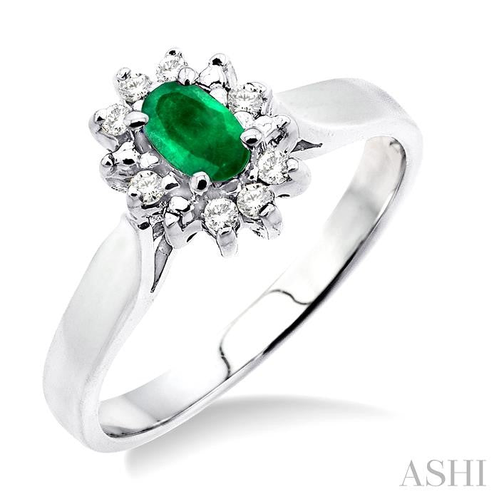 5x3mm Oval Cut Emerald and 1/10 Ctw Round Cut Diamond Ring in 10K White Gold