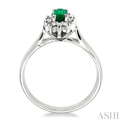 5x3mm Oval Cut Emerald and 1/10 Ctw Round Cut Diamond Ring in 10K White Gold