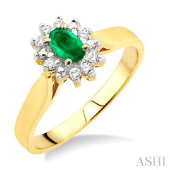 5x3mm Oval Cut Emerald and 1/10 Ctw Round Cut Diamond Ring in 10K Yellow Gold