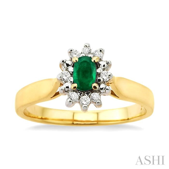 5x3mm Oval Cut Emerald and 1/10 Ctw Round Cut Diamond Ring in 10K Yellow Gold