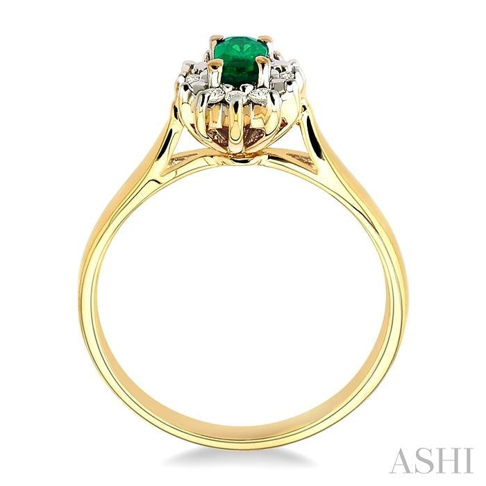 5x3mm Oval Cut Emerald and 1/10 Ctw Round Cut Diamond Ring in 10K Yellow Gold