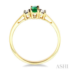 5x3 MM Oval Cut Emerald and 1/20 Ctw Round Cut Diamond Ring in 10K Yellow Gold