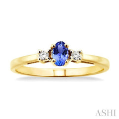 5x3mm Oval Cut Tanzanite and 1/20 Ctw Round Cut Diamond Ring in 10K Yellow Gold
