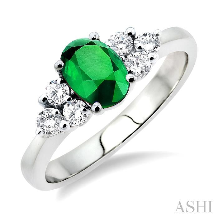 7x5mm Oval Cut Emerald and 1/3 Ctw Round Cut Diamond Ring in 14K White Gold