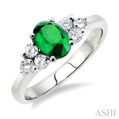 7x5mm Oval Cut Emerald and 1/3 Ctw Round Cut Diamond Ring in 14K White Gold