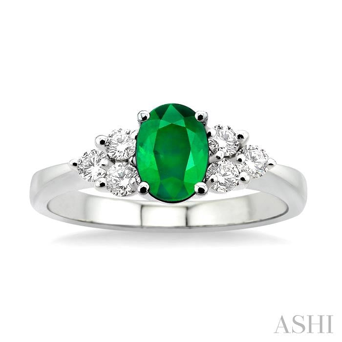 7x5mm Oval Cut Emerald and 1/3 Ctw Round Cut Diamond Ring in 14K White Gold