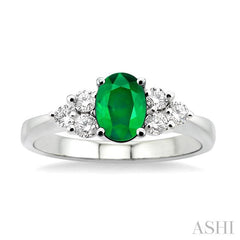 7x5mm Oval Cut Emerald and 1/3 Ctw Round Cut Diamond Ring in 14K White Gold