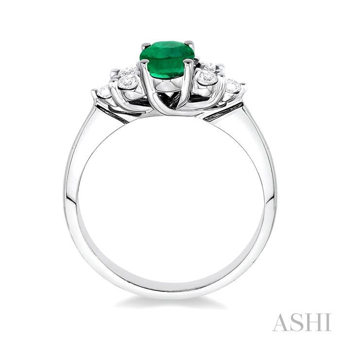 7x5mm Oval Cut Emerald and 1/3 Ctw Round Cut Diamond Ring in 14K White Gold