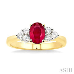 7x5mm Oval Cut Ruby and 1/3 Ctw Round Cut Diamond Ring in 14K Yellow Gold