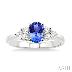 7x5mm Oval Cut Tanzanite and 1/3 Ctw Round Cut Diamond Ring in 14K White Gold