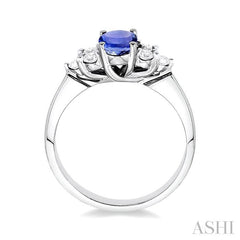 7x5mm Oval Cut Tanzanite and 1/3 Ctw Round Cut Diamond Ring in 14K White Gold