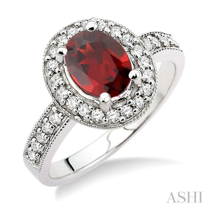 8x6mm Oval Cut Garnet and 1/3 Ctw Round Cut Diamond Ring in 14K White Gold