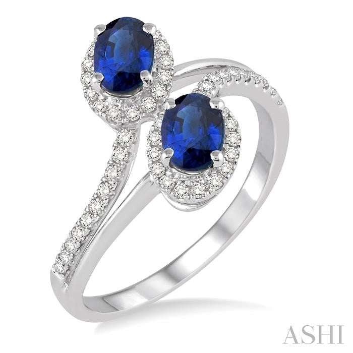 6x4 MM Oval Cut Sapphire and 1/4 ctw Round Cut Diamond Ring in 14K White Gold