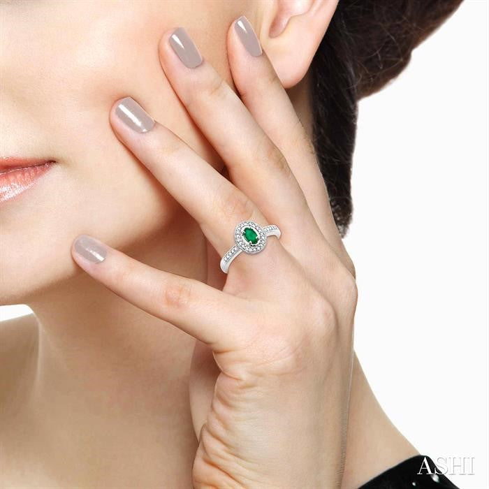 5x3 MM Oval Shape Emerald and 1/10 Ctw Round Cut Diamond Ring in 14K White Gold.
