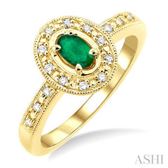 5x3 MM Oval Shape Emerald and 1/10 Ctw Round Cut Diamond Ring in 14K Yellow Gold.