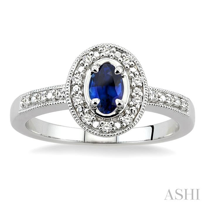 5x3 MM oval cut Sapphire and 1/10 Ctw Round Cut Diamond Ring in 14K White Gold.