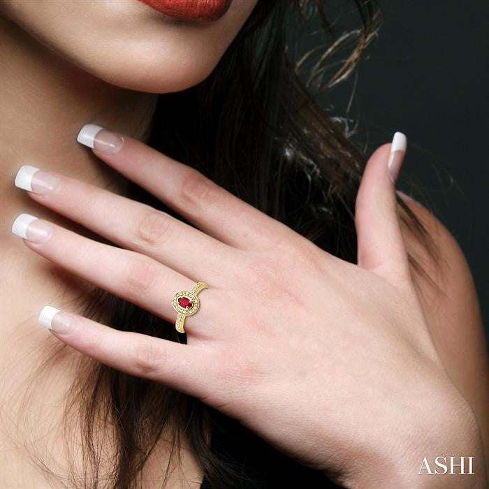 5x3 MM oval cut Ruby and 1/10 Ctw Round Cut Diamond Ring in 10K Yellow Gold.