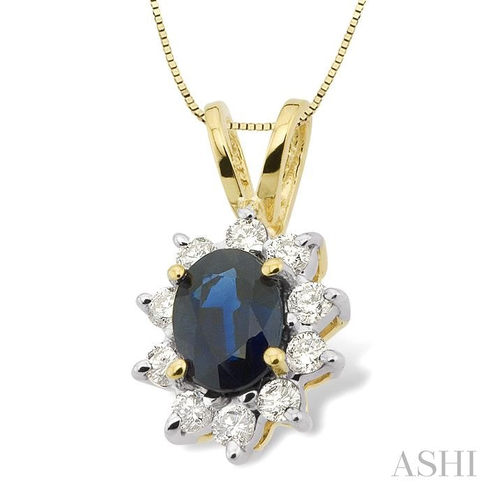 7x5MM Oval Cut Sapphire and 1/3 Ctw Round Cut Diamond Pendant in 14K Yellow Gold with Chain